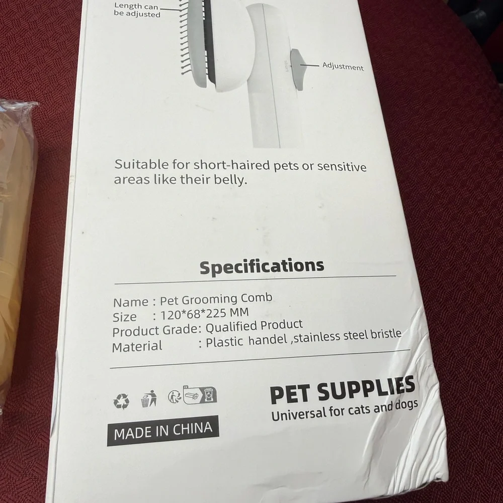 Orange and Gray Grooming Brush